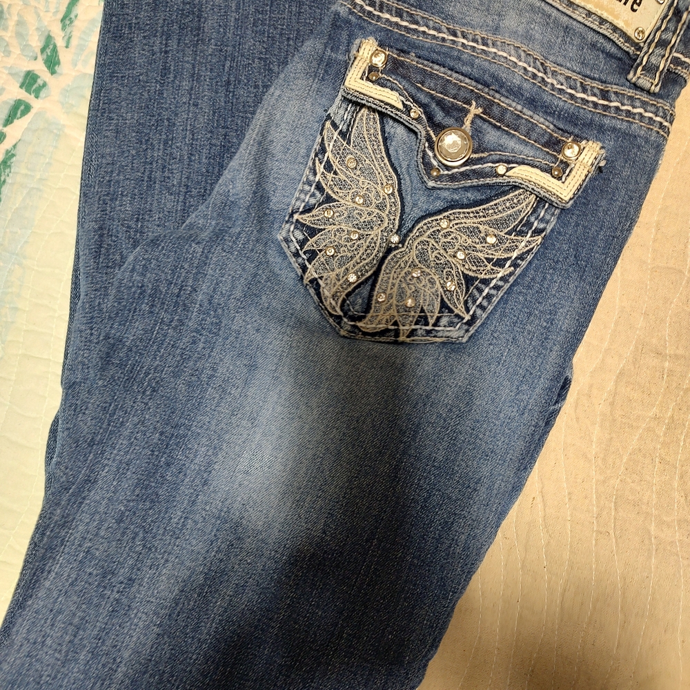 Stylish Blue Boot Cut Jeans with Butterfly Detail
